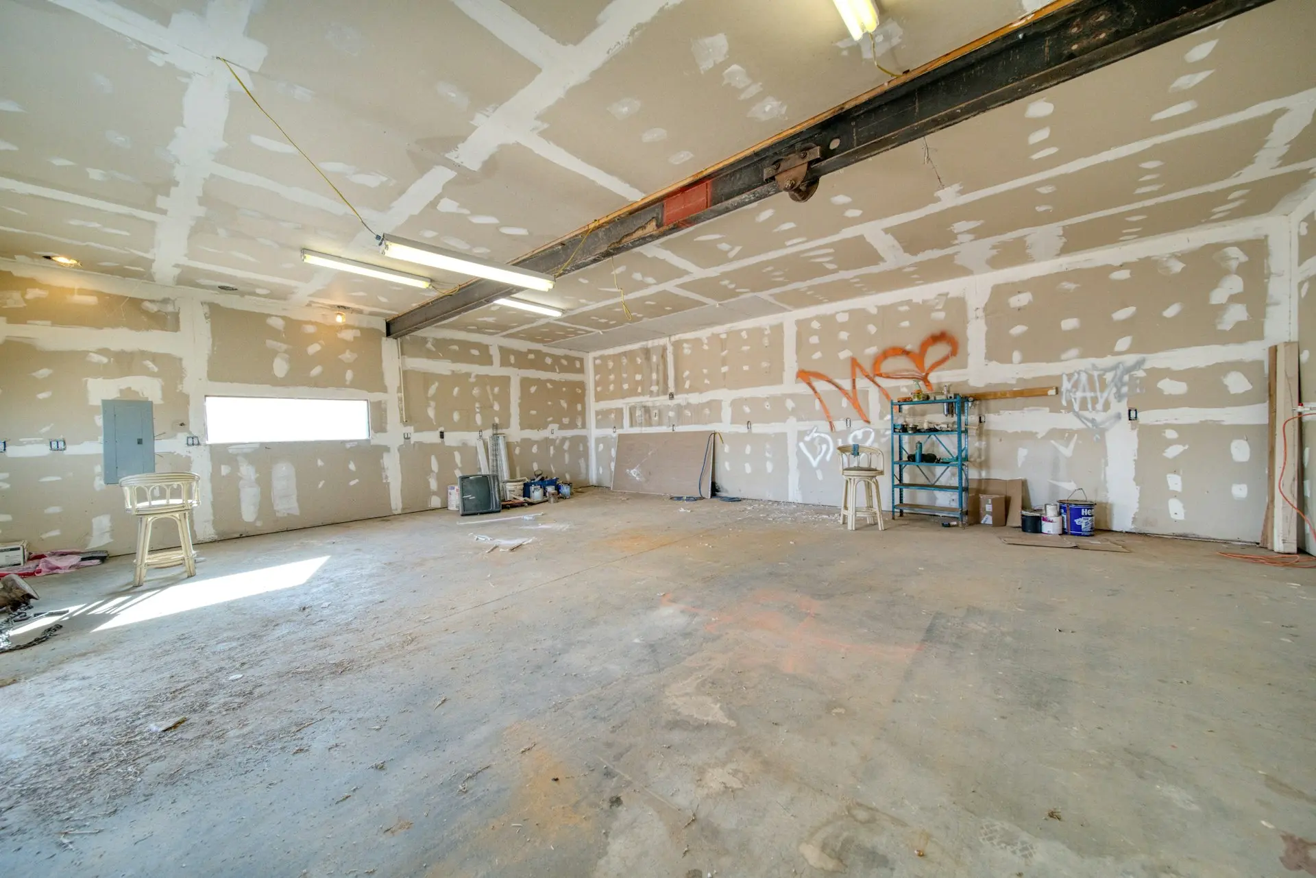 A large room with a lot of paint on the walls